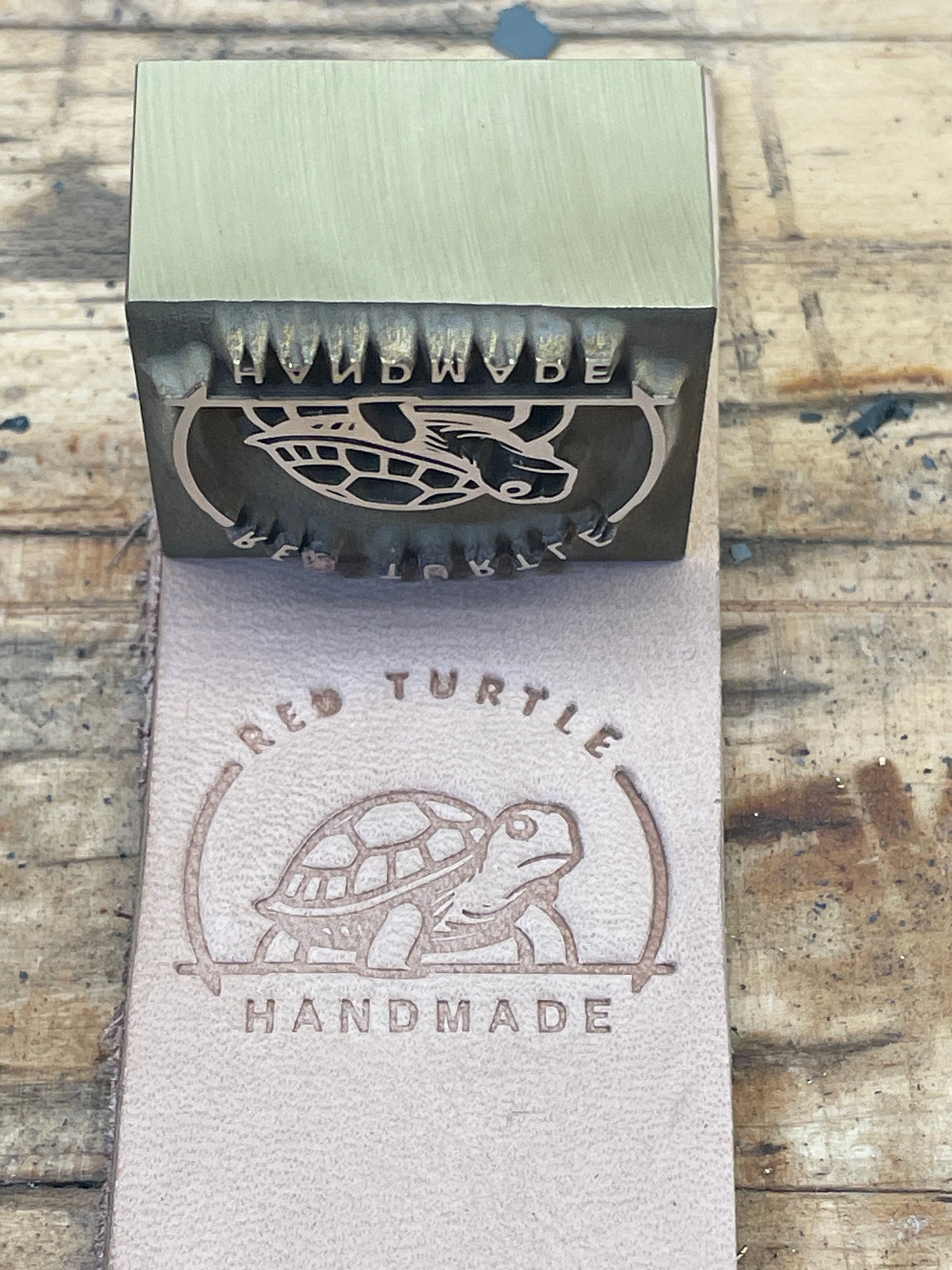 Stamp with threaded hole